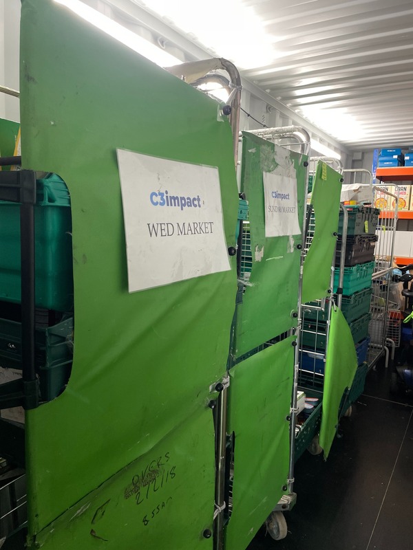 C3 Impact community market trolleys lined up ready for a Wednesday market
